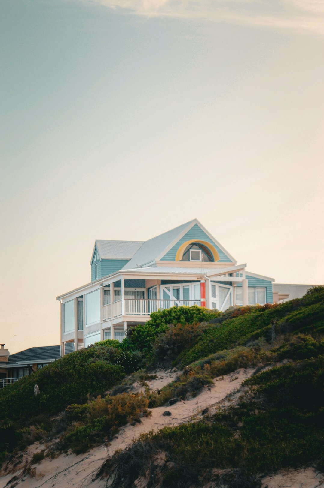 Coastal house with wraparound terrace overlooking dunes